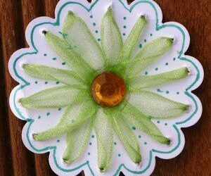 Fleur cousue en ruban taffetas